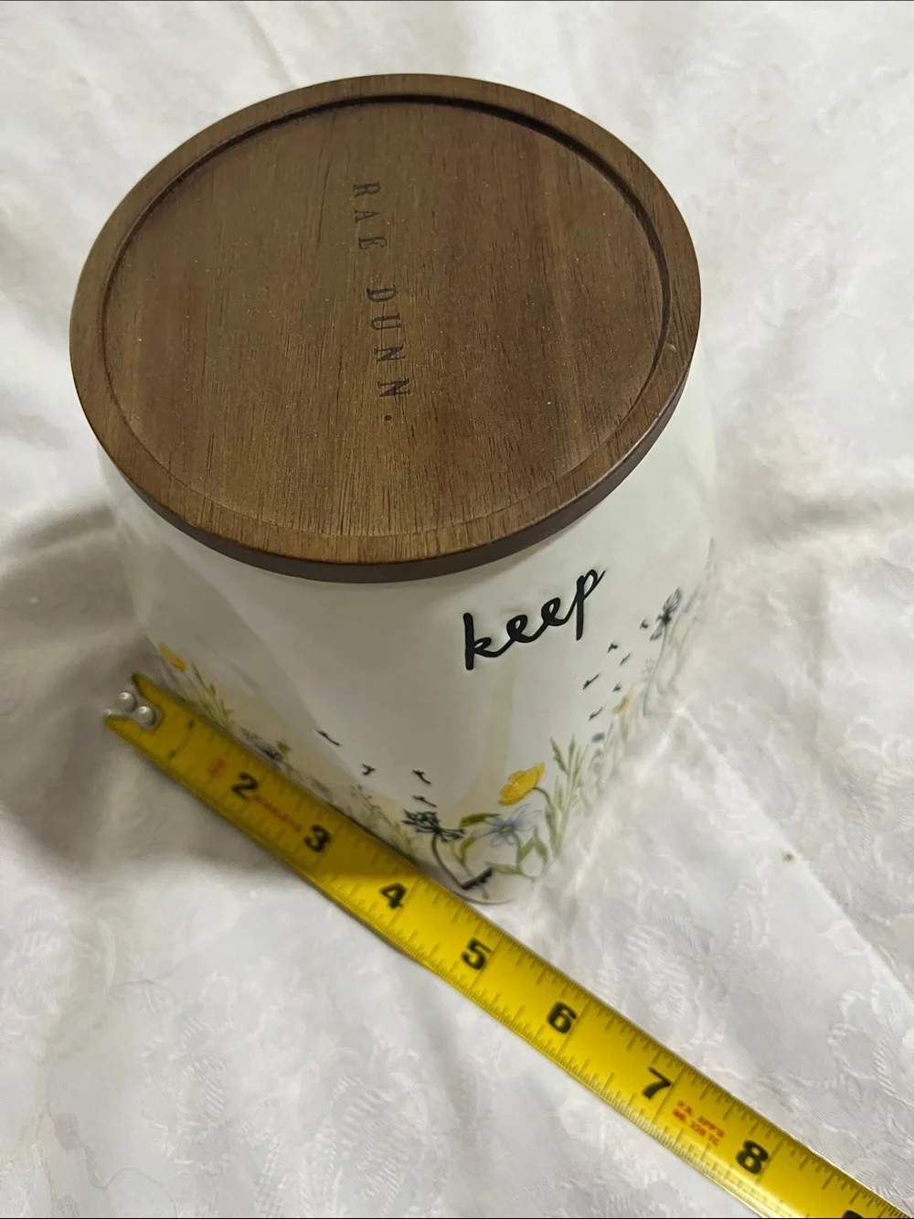 “Keep” Rae Dunn Floral Wildflower Ceramic Jar with Brown Wood Lid, 6” H x 4” D